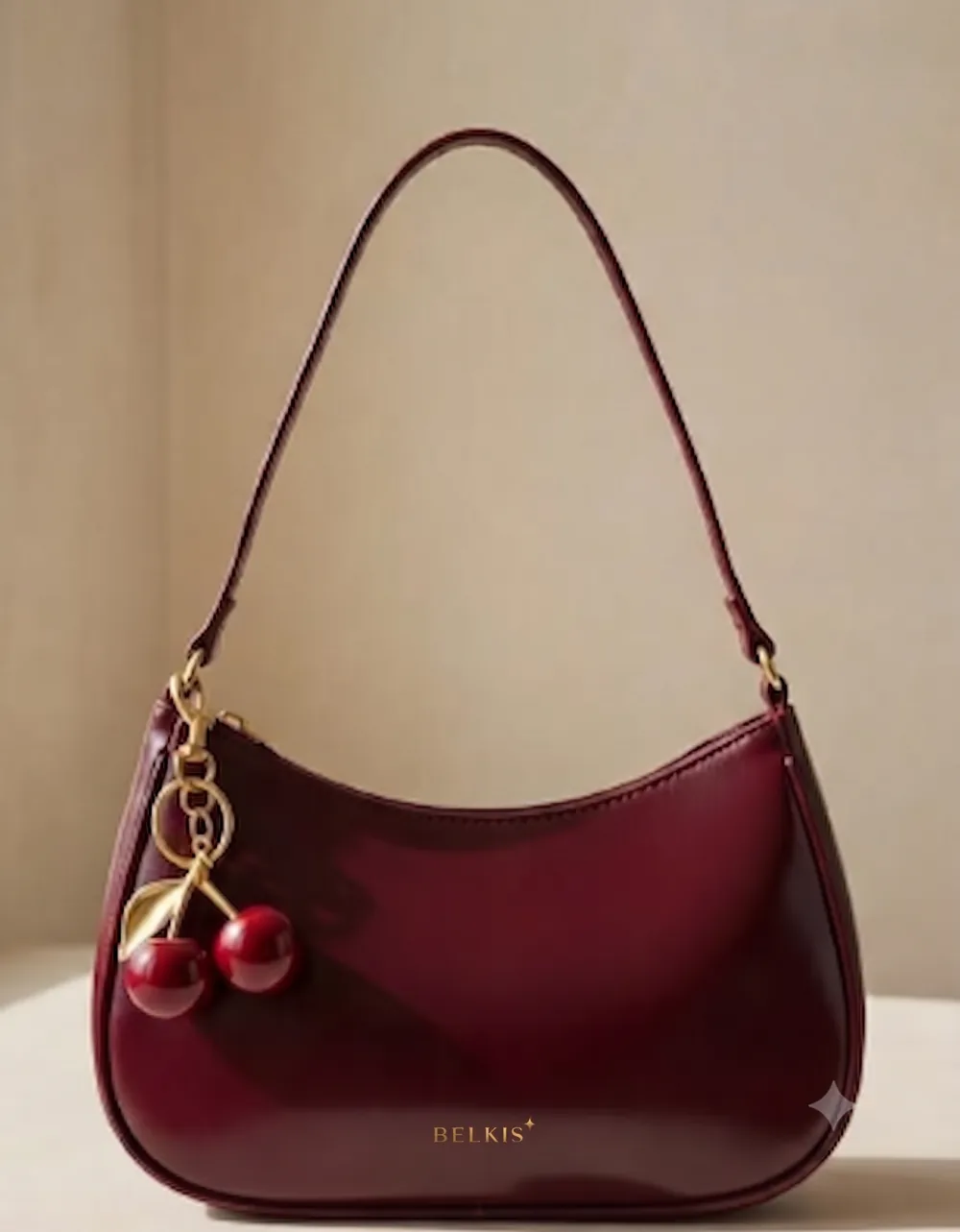 The Crescent, burgundy leather crescent shoulder bag